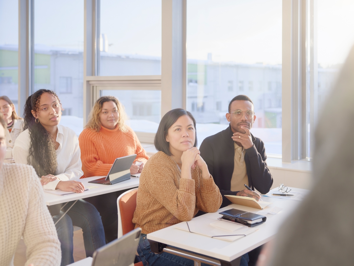 People learning in classroom setting